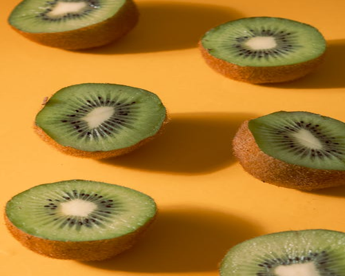 Fresh exotic tropical fruits on a pink background for balanced diet